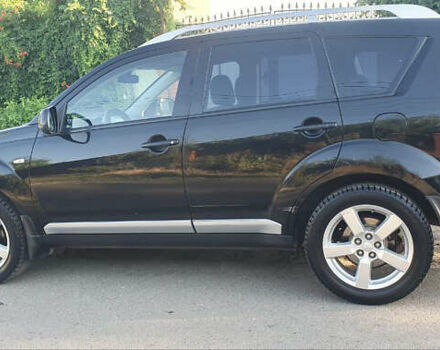 Чорний Міцубісі Аутлендер ХЛ, об'ємом двигуна 2.4 л та пробігом 325 тис. км за 7000 $, фото 2 на Automoto.ua