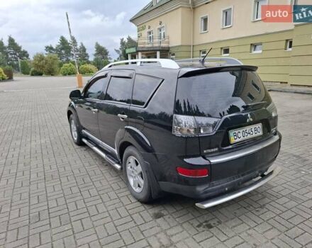 Черный Мицубиси Аутлендер ХЛ, объемом двигателя 2.4 л и пробегом 127 тыс. км за 10500 $, фото 9 на Automoto.ua
