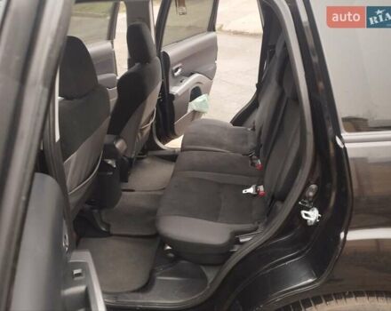 Черный Мицубиси Аутлендер ХЛ, объемом двигателя 2.36 л и пробегом 41 тыс. км за 12000 $, фото 6 на Automoto.ua