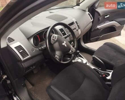 Черный Мицубиси Аутлендер ХЛ, объемом двигателя 2.36 л и пробегом 41 тыс. км за 12000 $, фото 7 на Automoto.ua