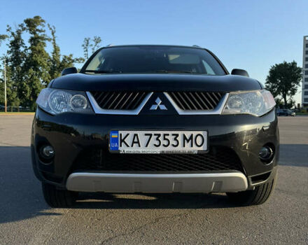 Черный Мицубиси Аутлендер ХЛ, объемом двигателя 2.36 л и пробегом 115 тыс. км за 12000 $, фото 5 на Automoto.ua