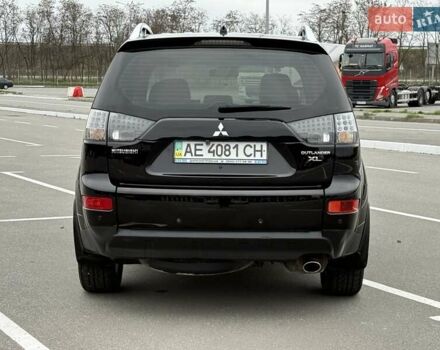 Черный Мицубиси Аутлендер ХЛ, объемом двигателя 2.36 л и пробегом 175 тыс. км за 9700 $, фото 6 на Automoto.ua
