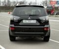 Черный Мицубиси Аутлендер ХЛ, объемом двигателя 2.36 л и пробегом 175 тыс. км за 9700 $, фото 6 на Automoto.ua
