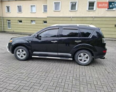 Черный Мицубиси Аутлендер ХЛ, объемом двигателя 2.4 л и пробегом 127 тыс. км за 10500 $, фото 6 на Automoto.ua