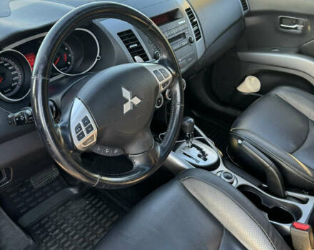 Черный Мицубиси Аутлендер ХЛ, объемом двигателя 2.36 л и пробегом 115 тыс. км за 12000 $, фото 17 на Automoto.ua