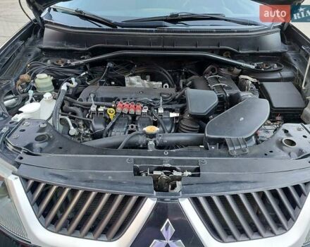 Чорний Міцубісі Аутлендер ХЛ, об'ємом двигуна 2.4 л та пробігом 181 тис. км за 8990 $, фото 15 на Automoto.ua