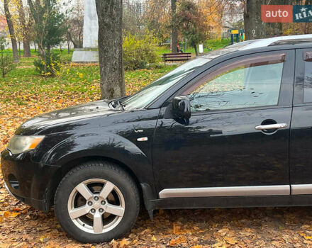 Черный Мицубиси Аутлендер ХЛ, объемом двигателя 3 л и пробегом 285 тыс. км за 9590 $, фото 6 на Automoto.ua