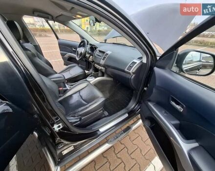 Черный Мицубиси Аутлендер ХЛ, объемом двигателя 2.36 л и пробегом 211 тыс. км за 10500 $, фото 19 на Automoto.ua