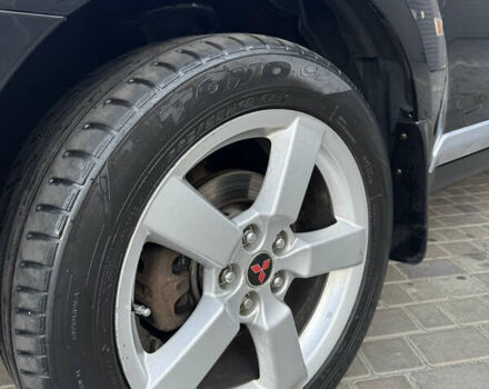 Чорний Міцубісі Аутлендер ХЛ, об'ємом двигуна 3 л та пробігом 243 тис. км за 12500 $, фото 30 на Automoto.ua