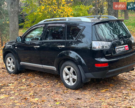 Черный Мицубиси Аутлендер ХЛ, объемом двигателя 3 л и пробегом 285 тыс. км за 9590 $, фото 7 на Automoto.ua