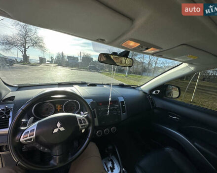 Черный Мицубиси Аутлендер ХЛ, объемом двигателя 2.4 л и пробегом 198 тыс. км за 11000 $, фото 20 на Automoto.ua