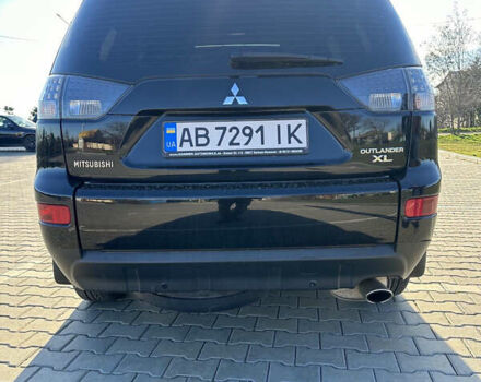 Черный Мицубиси Аутлендер ХЛ, объемом двигателя 2.4 л и пробегом 198 тыс. км за 11000 $, фото 11 на Automoto.ua