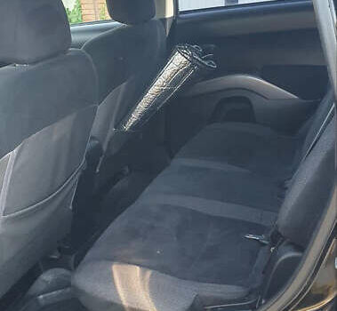 Чорний Міцубісі Аутлендер ХЛ, об'ємом двигуна 2.4 л та пробігом 325 тис. км за 7000 $, фото 6 на Automoto.ua