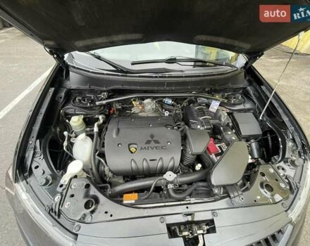 Черный Мицубиси Аутлендер ХЛ, объемом двигателя 2.4 л и пробегом 198 тыс. км за 9200 $, фото 3 на Automoto.ua