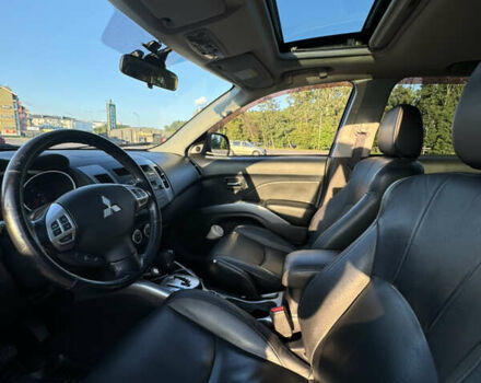 Черный Мицубиси Аутлендер ХЛ, объемом двигателя 2.36 л и пробегом 115 тыс. км за 12000 $, фото 16 на Automoto.ua