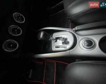 Черный Мицубиси Аутлендер ХЛ, объемом двигателя 2.4 л и пробегом 198 тыс. км за 9200 $, фото 16 на Automoto.ua