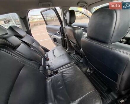 Черный Мицубиси Аутлендер ХЛ, объемом двигателя 2.36 л и пробегом 211 тыс. км за 10500 $, фото 18 на Automoto.ua