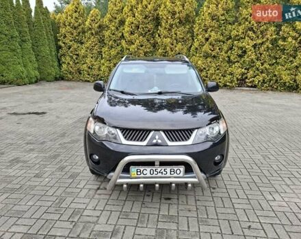 Черный Мицубиси Аутлендер ХЛ, объемом двигателя 2.4 л и пробегом 127 тыс. км за 10500 $, фото 16 на Automoto.ua