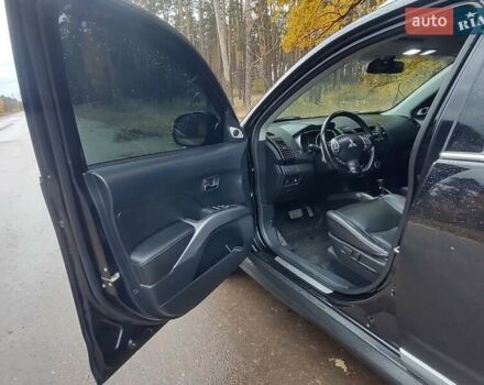 Черный Мицубиси Аутлендер ХЛ, объемом двигателя 3 л и пробегом 240 тыс. км за 9400 $, фото 11 на Automoto.ua