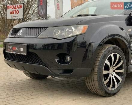 Черный Мицубиси Аутлендер ХЛ, объемом двигателя 2.4 л и пробегом 175 тыс. км за 10499 $, фото 10 на Automoto.ua