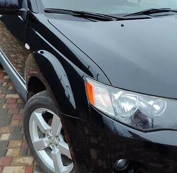 Чорний Міцубісі Аутлендер ХЛ, об'ємом двигуна 2.36 л та пробігом 150 тис. км за 11100 $, фото 11 на Automoto.ua