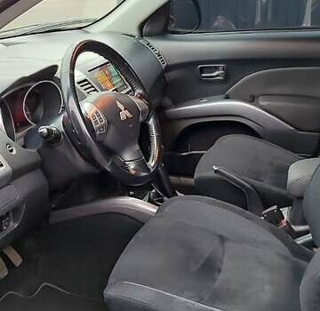 Чорний Міцубісі Аутлендер ХЛ, об'ємом двигуна 2.36 л та пробігом 150 тис. км за 11100 $, фото 14 на Automoto.ua