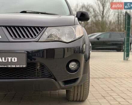 Черный Мицубиси Аутлендер ХЛ, объемом двигателя 2.4 л и пробегом 175 тыс. км за 10499 $, фото 9 на Automoto.ua