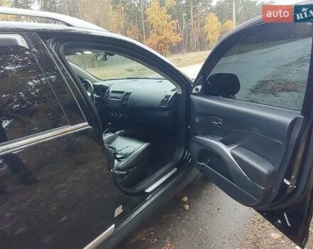Черный Мицубиси Аутлендер ХЛ, объемом двигателя 3 л и пробегом 240 тыс. км за 9400 $, фото 8 на Automoto.ua