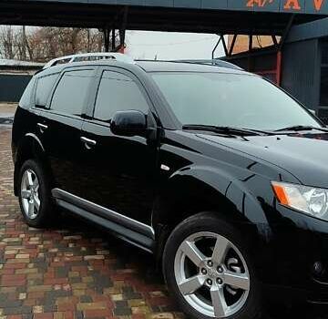 Чорний Міцубісі Аутлендер ХЛ, об'ємом двигуна 2.36 л та пробігом 150 тис. км за 11100 $, фото 1 на Automoto.ua