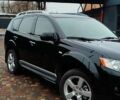 Чорний Міцубісі Аутлендер ХЛ, об'ємом двигуна 2.36 л та пробігом 150 тис. км за 11100 $, фото 1 на Automoto.ua