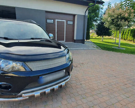 Черный Мицубиси Аутлендер ХЛ, объемом двигателя 2.4 л и пробегом 146 тыс. км за 10500 $, фото 4 на Automoto.ua