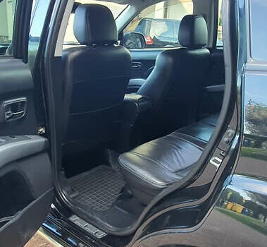 Черный Мицубиси Аутлендер ХЛ, объемом двигателя 2.4 л и пробегом 146 тыс. км за 10500 $, фото 15 на Automoto.ua