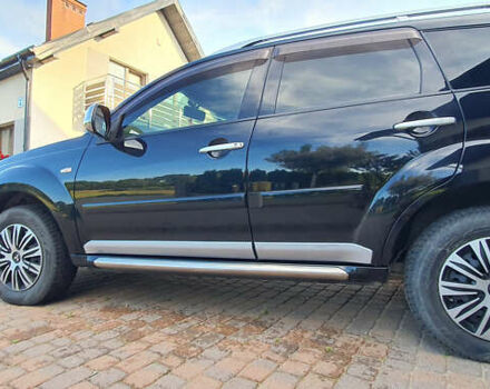 Черный Мицубиси Аутлендер ХЛ, объемом двигателя 2.4 л и пробегом 146 тыс. км за 10500 $, фото 5 на Automoto.ua