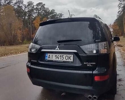 Черный Мицубиси Аутлендер ХЛ, объемом двигателя 3 л и пробегом 240 тыс. км за 9400 $, фото 7 на Automoto.ua