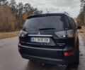 Черный Мицубиси Аутлендер ХЛ, объемом двигателя 3 л и пробегом 240 тыс. км за 9400 $, фото 7 на Automoto.ua