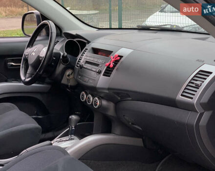 Черный Мицубиси Аутлендер ХЛ, объемом двигателя 2.4 л и пробегом 175 тыс. км за 10499 $, фото 32 на Automoto.ua