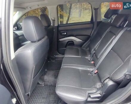 Черный Мицубиси Аутлендер ХЛ, объемом двигателя 3 л и пробегом 240 тыс. км за 9400 $, фото 13 на Automoto.ua