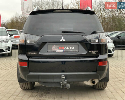 Черный Мицубиси Аутлендер ХЛ, объемом двигателя 2.4 л и пробегом 175 тыс. км за 10499 $, фото 15 на Automoto.ua