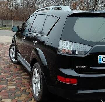 Чорний Міцубісі Аутлендер ХЛ, об'ємом двигуна 2.36 л та пробігом 150 тис. км за 11100 $, фото 6 на Automoto.ua