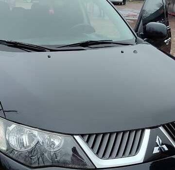 Чорний Міцубісі Аутлендер ХЛ, об'ємом двигуна 2.36 л та пробігом 150 тис. км за 11100 $, фото 12 на Automoto.ua