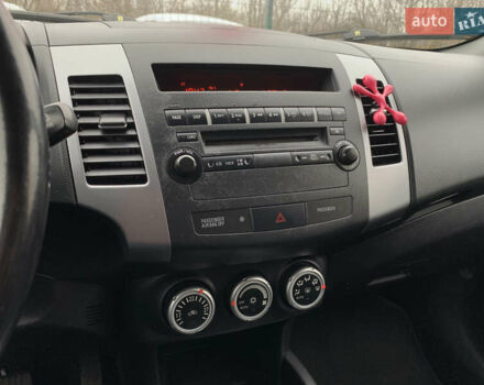 Черный Мицубиси Аутлендер ХЛ, объемом двигателя 2.4 л и пробегом 175 тыс. км за 10499 $, фото 48 на Automoto.ua