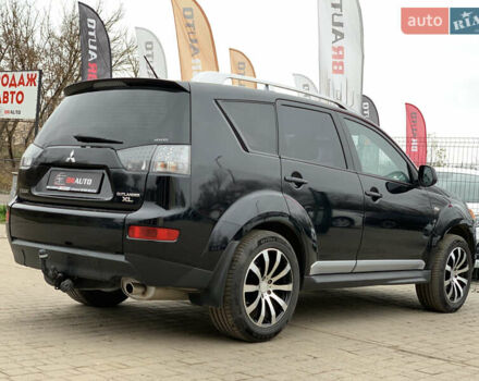 Черный Мицубиси Аутлендер ХЛ, объемом двигателя 2.4 л и пробегом 175 тыс. км за 10499 $, фото 12 на Automoto.ua