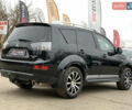 Черный Мицубиси Аутлендер ХЛ, объемом двигателя 2.4 л и пробегом 175 тыс. км за 10499 $, фото 12 на Automoto.ua