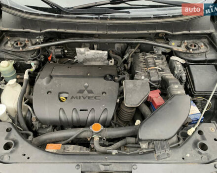 Черный Мицубиси Аутлендер ХЛ, объемом двигателя 2.4 л и пробегом 175 тыс. км за 10499 $, фото 50 на Automoto.ua