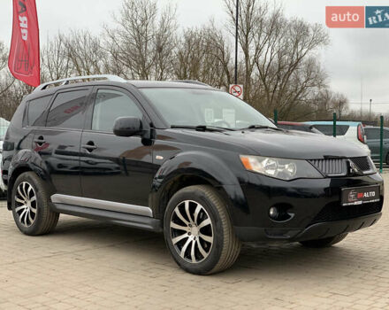 Черный Мицубиси Аутлендер ХЛ, объемом двигателя 2.4 л и пробегом 175 тыс. км за 10499 $, фото 4 на Automoto.ua