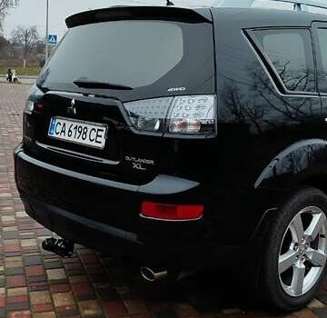 Чорний Міцубісі Аутлендер ХЛ, об'ємом двигуна 2.36 л та пробігом 150 тис. км за 11100 $, фото 7 на Automoto.ua