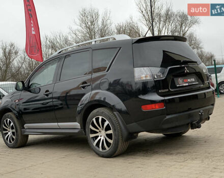 Черный Мицубиси Аутлендер ХЛ, объемом двигателя 2.4 л и пробегом 175 тыс. км за 10499 $, фото 16 на Automoto.ua