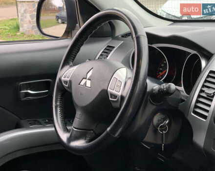 Черный Мицубиси Аутлендер ХЛ, объемом двигателя 2.4 л и пробегом 175 тыс. км за 10499 $, фото 33 на Automoto.ua