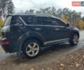 Черный Мицубиси Аутлендер ХЛ, объемом двигателя 3 л и пробегом 240 тыс. км за 9400 $, фото 6 на Automoto.ua