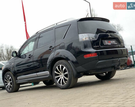 Черный Мицубиси Аутлендер ХЛ, объемом двигателя 2.4 л и пробегом 175 тыс. км за 10499 $, фото 17 на Automoto.ua